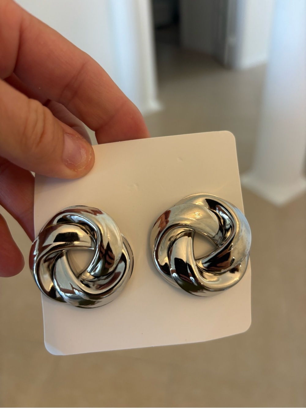 Polished Silver Knot Stud Earrings - Classic Swirl Design